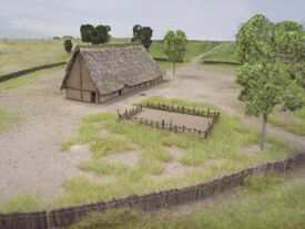 L’habitat néolithique d’Arleux (Nord) - Maquette Les bâtiments du Néolithique final de la région sont organisés par quelques poteaux espacés soutenant la charpente avec une vaste zone centrale.